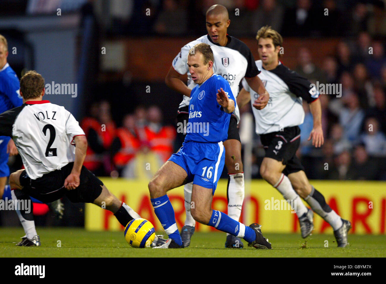 Soccer - FA Barclays Premiership - Fulham v Chelsea. Chelsea's Arjen Robben takes on Fulham's Moritz Volz on his way to scoring his goal Stock Photo