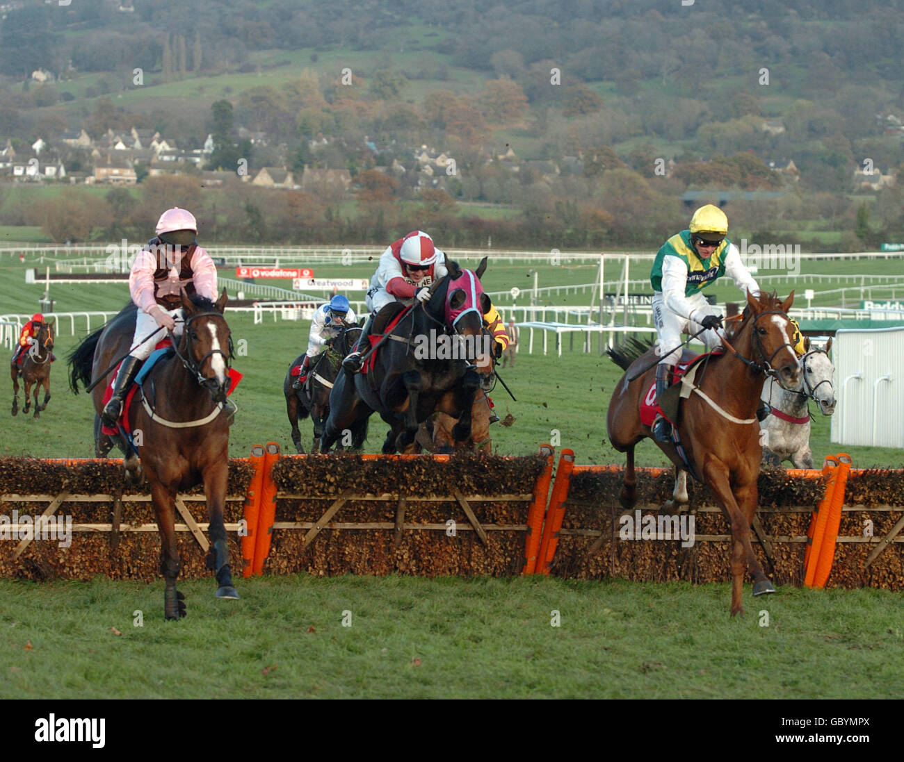 Horse Racing - Cheltenham Races. Accordion Etoile (left) riden by John ...