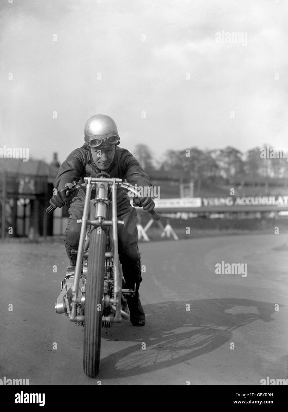 Motor Racing - British Motorcycle Racing Club Meeting - Brooklands. Tommy Atkins on a Douglas motorcycle at Brooklands. Stock Photo