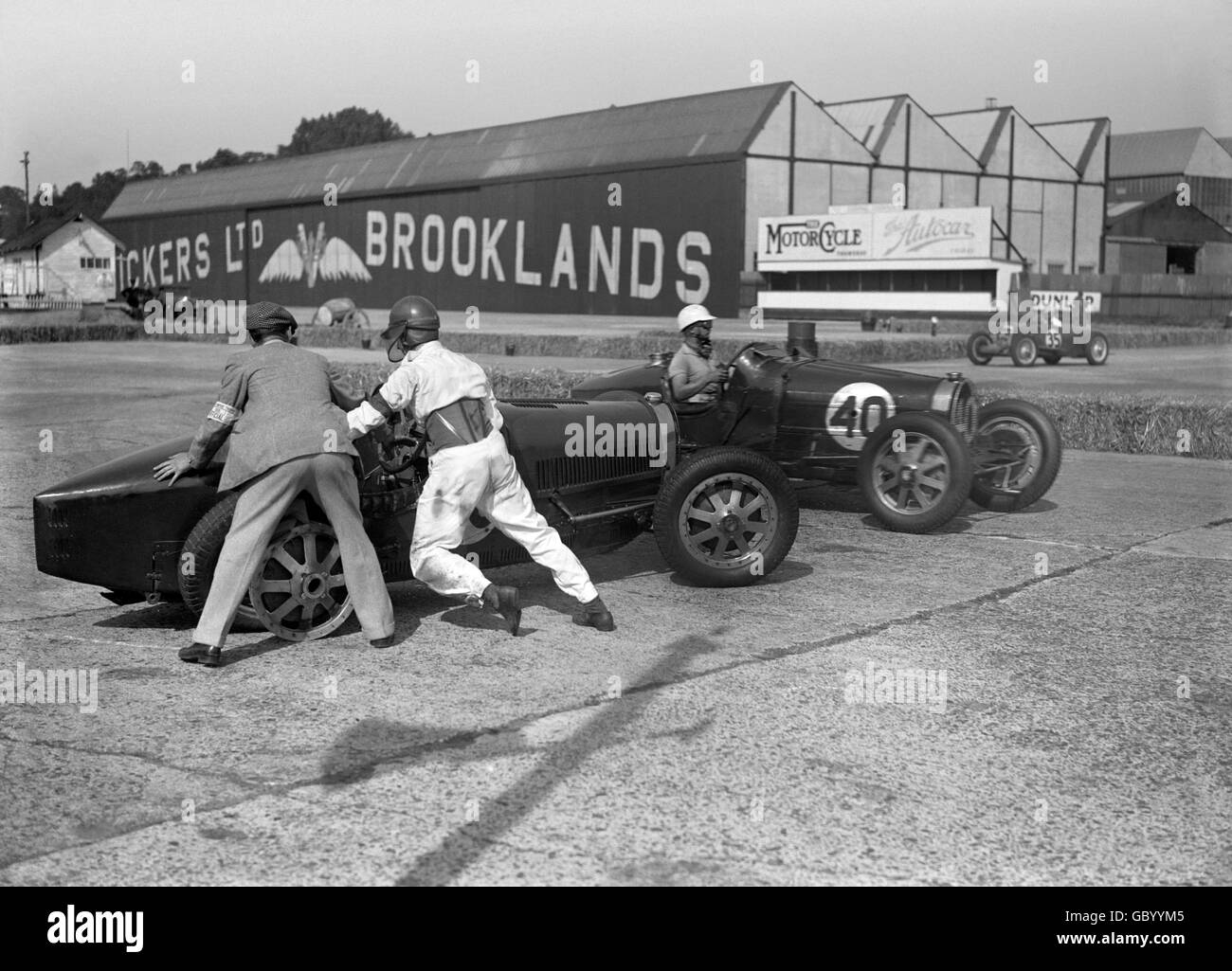 Teddy Rayson in a Bugatti and Arthur Dobson in a Bugatti (40) during the British Empire Trophy race at Brooklands. Stock Photo