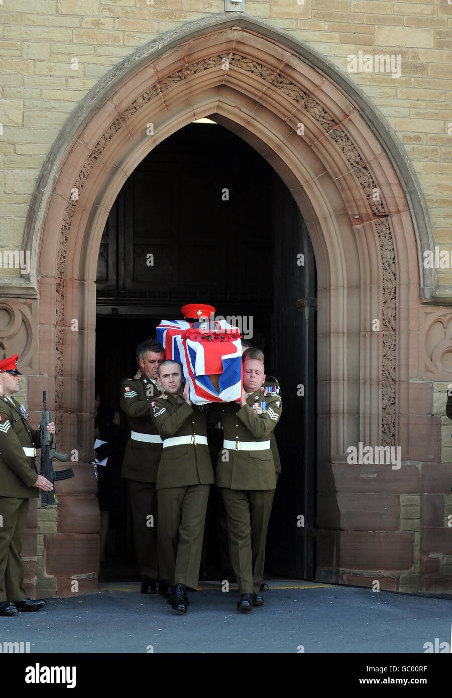 The coffin of Trooper Christopher Whiteside, 20, of The Light Dragoons, is carried out of Holy Trinity Church at his funeral in Blackpool. The soldier died in a blast caused by an improvised explosive device near Gereshk in Helmand province on July 7. PRESS ASSOCIATION Photo. Picture date: Friday July 24, 2009. See PA story FUNERAL Afghanistan. Photo credit should read: Brian Williamson/PA Wire Stock Photo