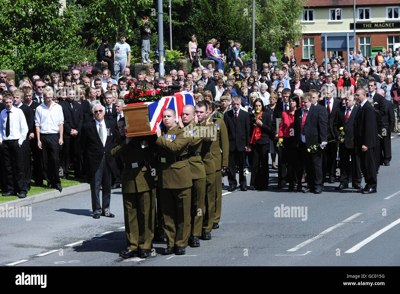 The family of Rifleman James Backhouse during the funeral procession for the soldier in Castleford, West Yorkshire. Backhouse died in an explosion near Sangin in Helmand province on July 10. Stock Photo