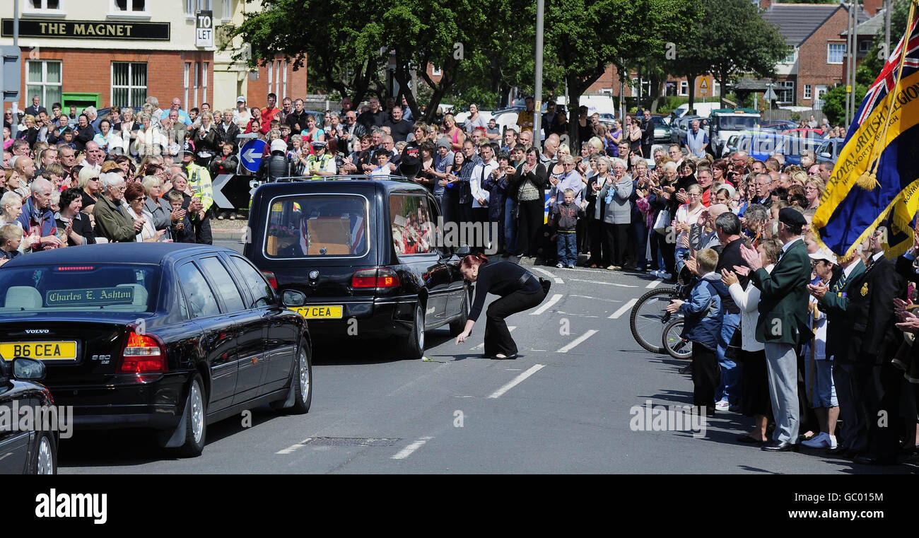 The funeral procession of Rifleman James Backhouse makes its way through Castleford, West Yorkshire. Backhouse died in an explosion near Sangin in Helmand province on July 10. Stock Photo