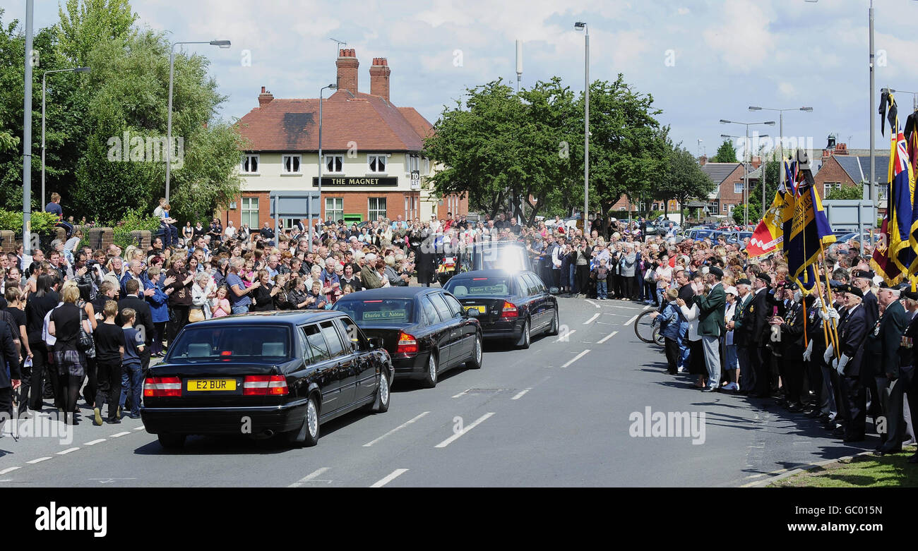 The funeral procession of Rifleman James Backhouse makes its way through Castleford, West Yorkshire. Backhouse died in an explosion near Sangin in Helmand province on July 10. Stock Photo