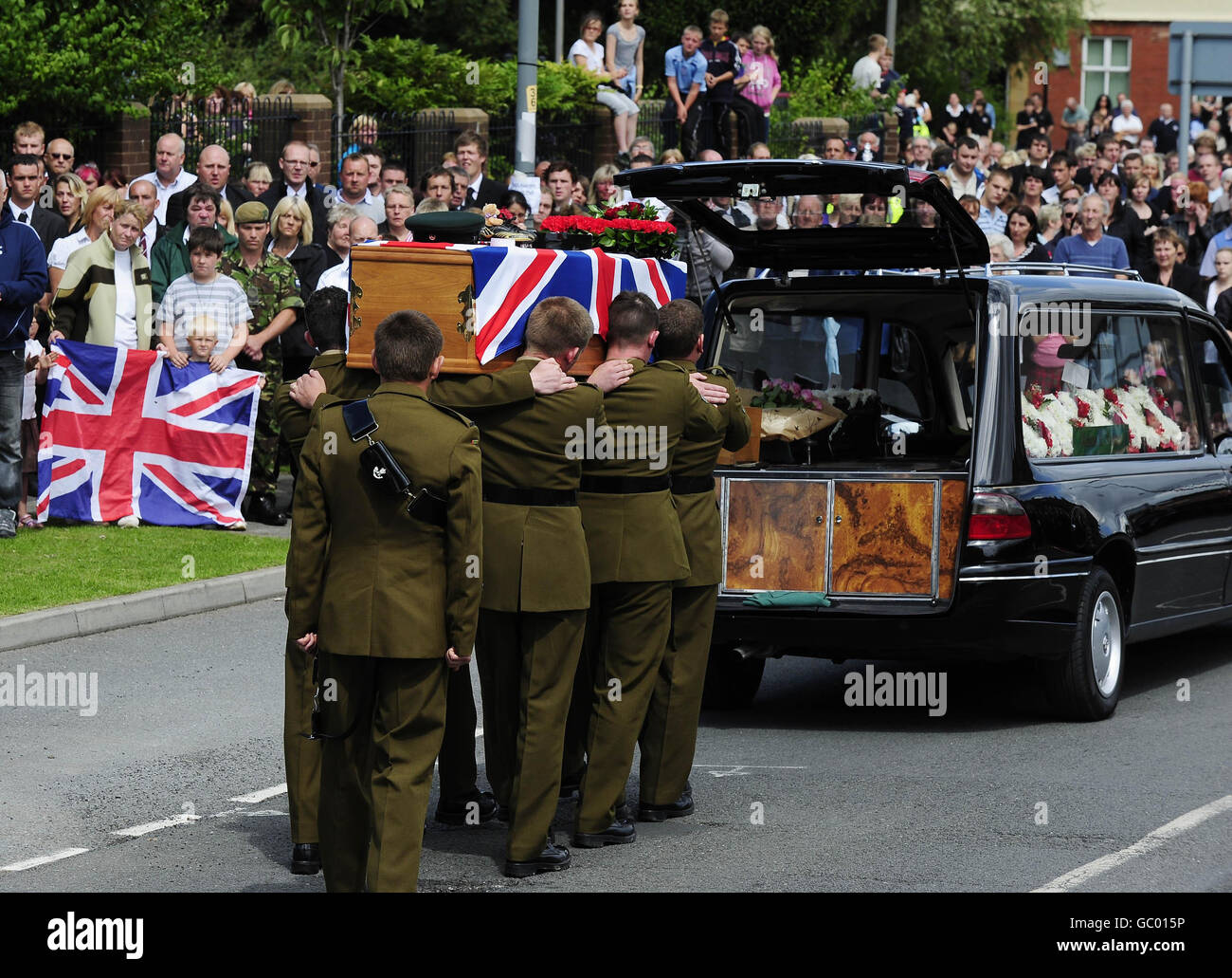 The coffin of Rifleman James Backhouse during his funeral procession in Castleford, West Yorkshire. Backhouse died in an explosion near Sangin in Helmand province on July 10. Stock Photo