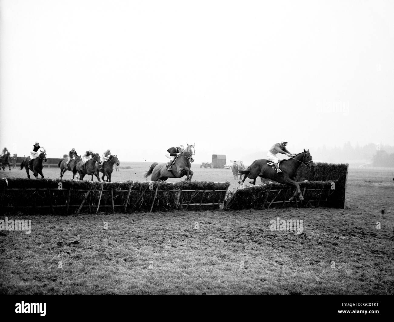 Horse Racing - Schweppes Gold Trophy Handicap Hurdle - Newbury. Rosyth (r), Josh Gifford up, leads from Salmon Spray (l), Johnny Haine up, on his way to victory Stock Photo