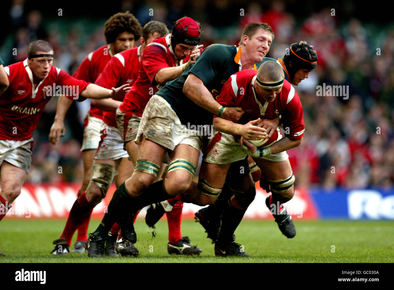 Brent Cockbain (Celtic Warriors) holds the ball as he is challeged during  the Celtic League match against Munster at Pontpridd Stock Photo - Alamy