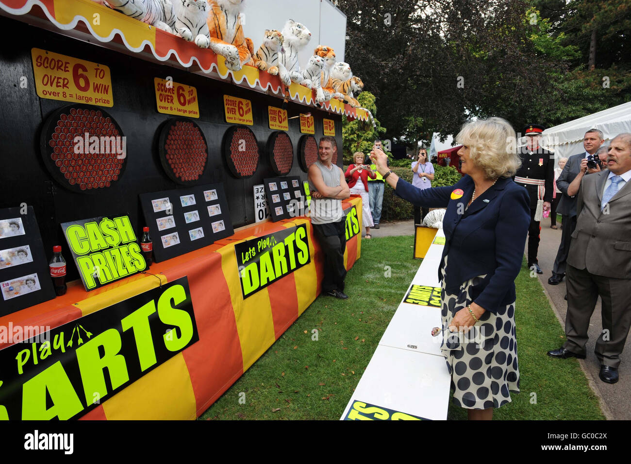 The Duchess of Cornwall tries her hand at darts at the West Wilts Show, at Trowbridge Park, Wiltshire. Stock Photo