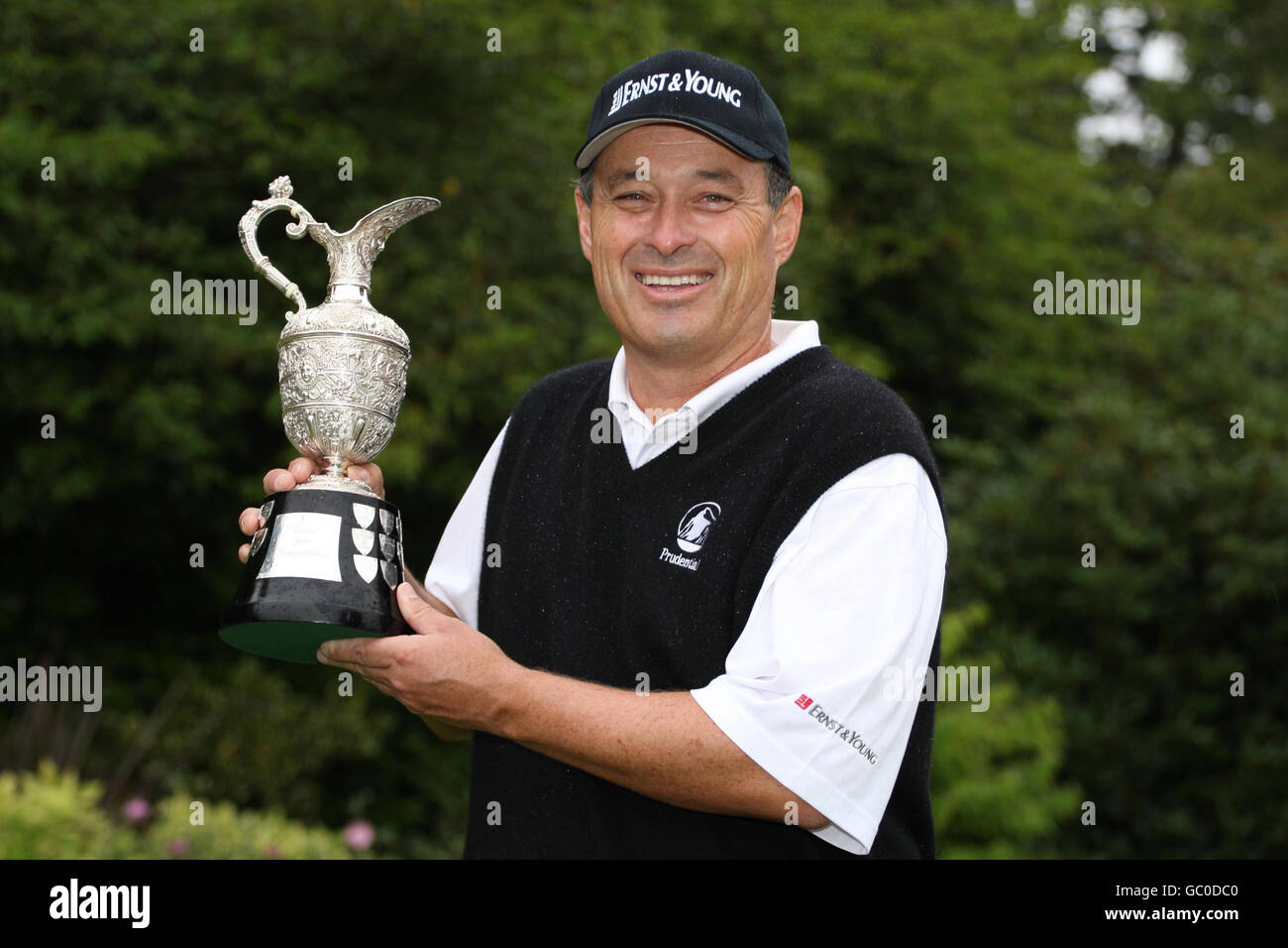 USA's Loren Roberts celebrates as he holds the British Senior Open