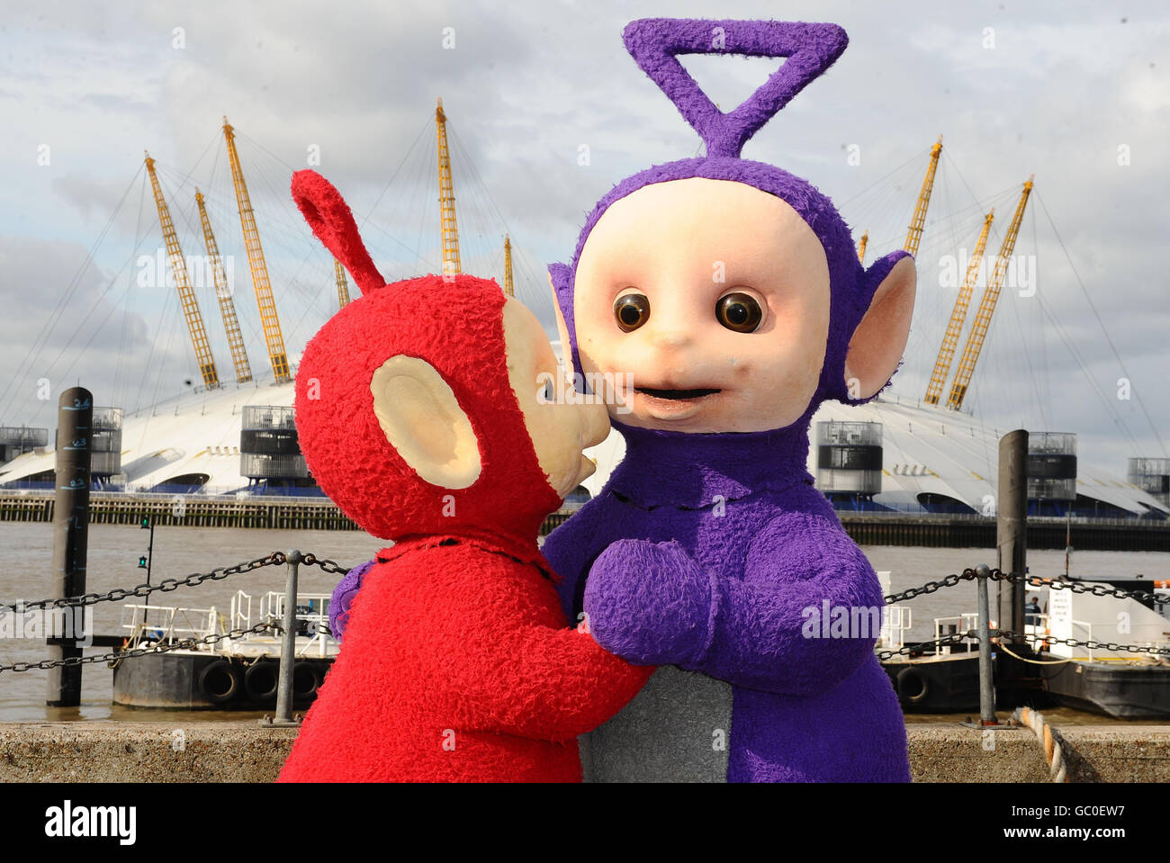 Po (left) and Tinky Winky of the Teletubbies close to the O2 Arena, London. Stock Photo