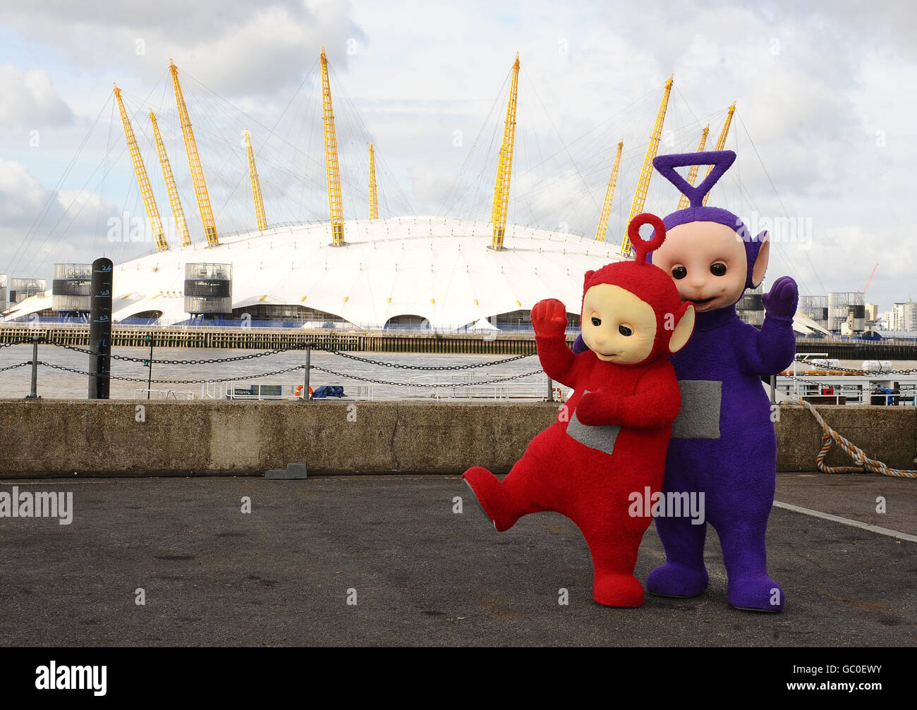Po (left) and Tinky Winky of the Teletubbies close to the O2 Arena, London. Stock Photo