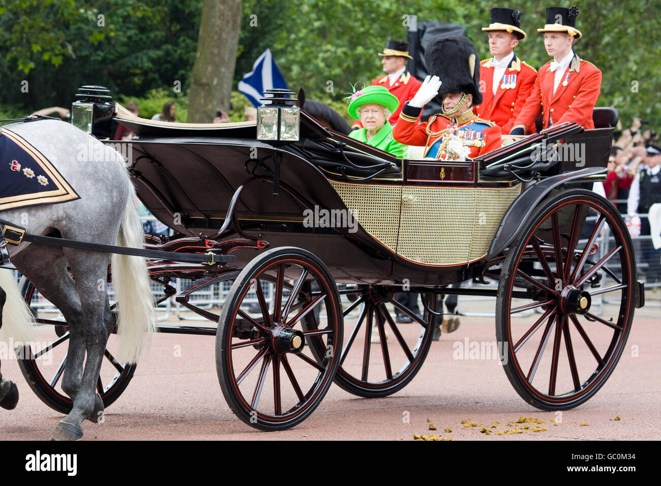 Prince Phillip saluting the crowd from the Ivory Mounted Phaeton with the Queen of England Stock Photo