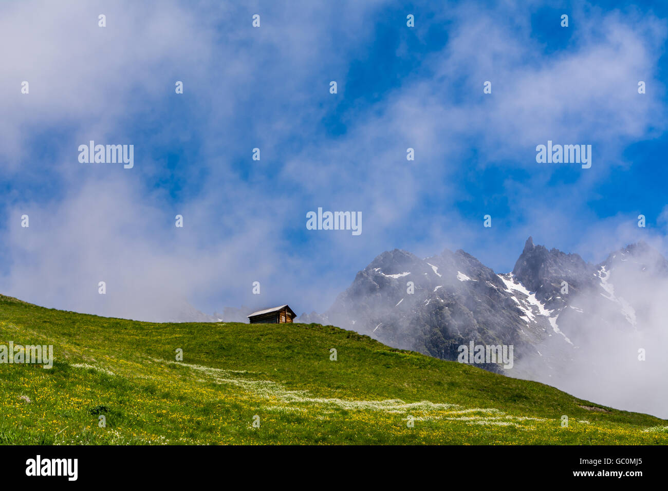 A small mountain hut in the Swiss alps at Verbier in Switzerland in summer Stock Photo
