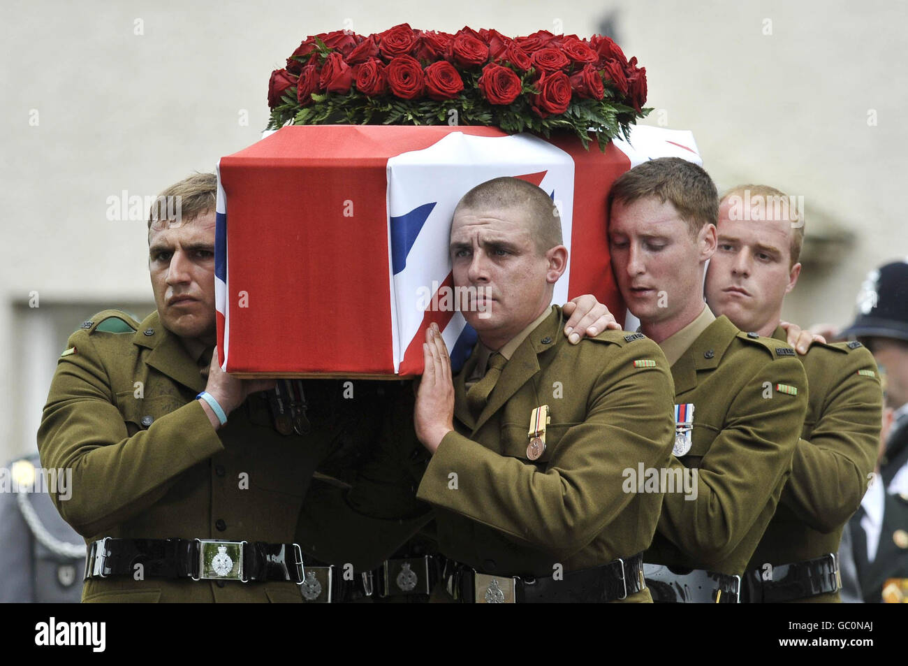 The flag draped coffin of Harry Patch is carried by soldiers from The
