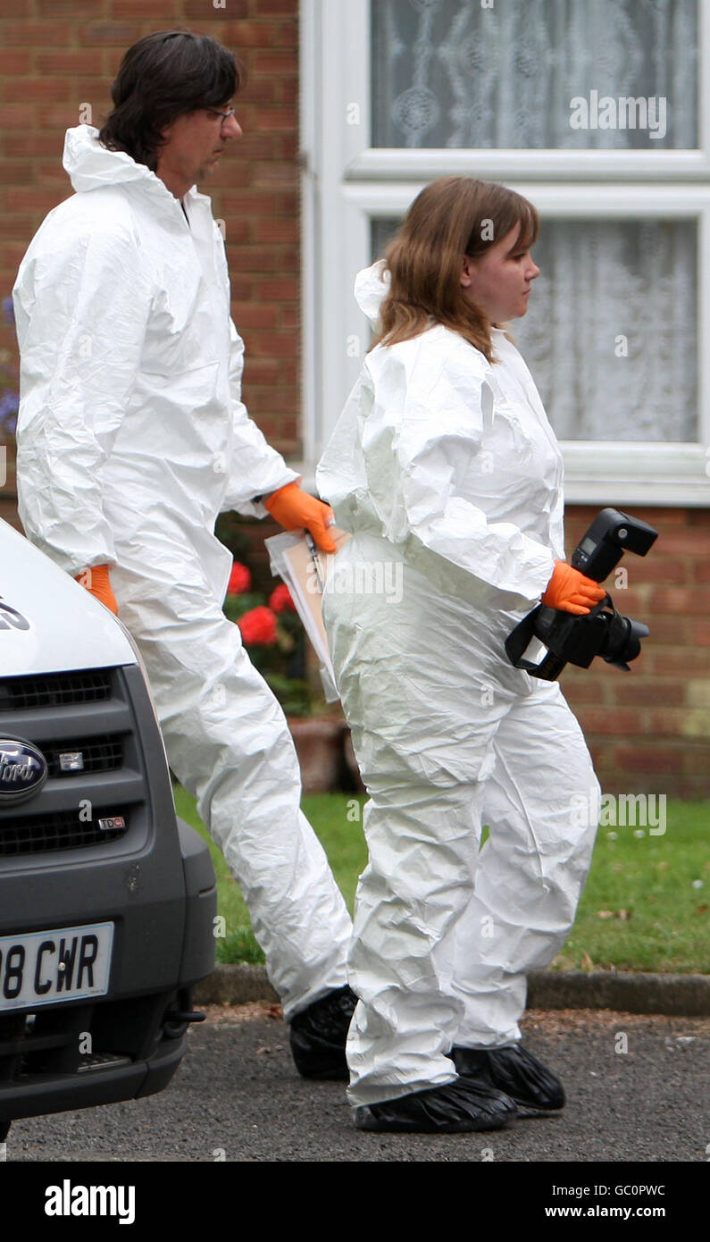 Suffolk Police forensic officers arrive at a block of flats in Limerick