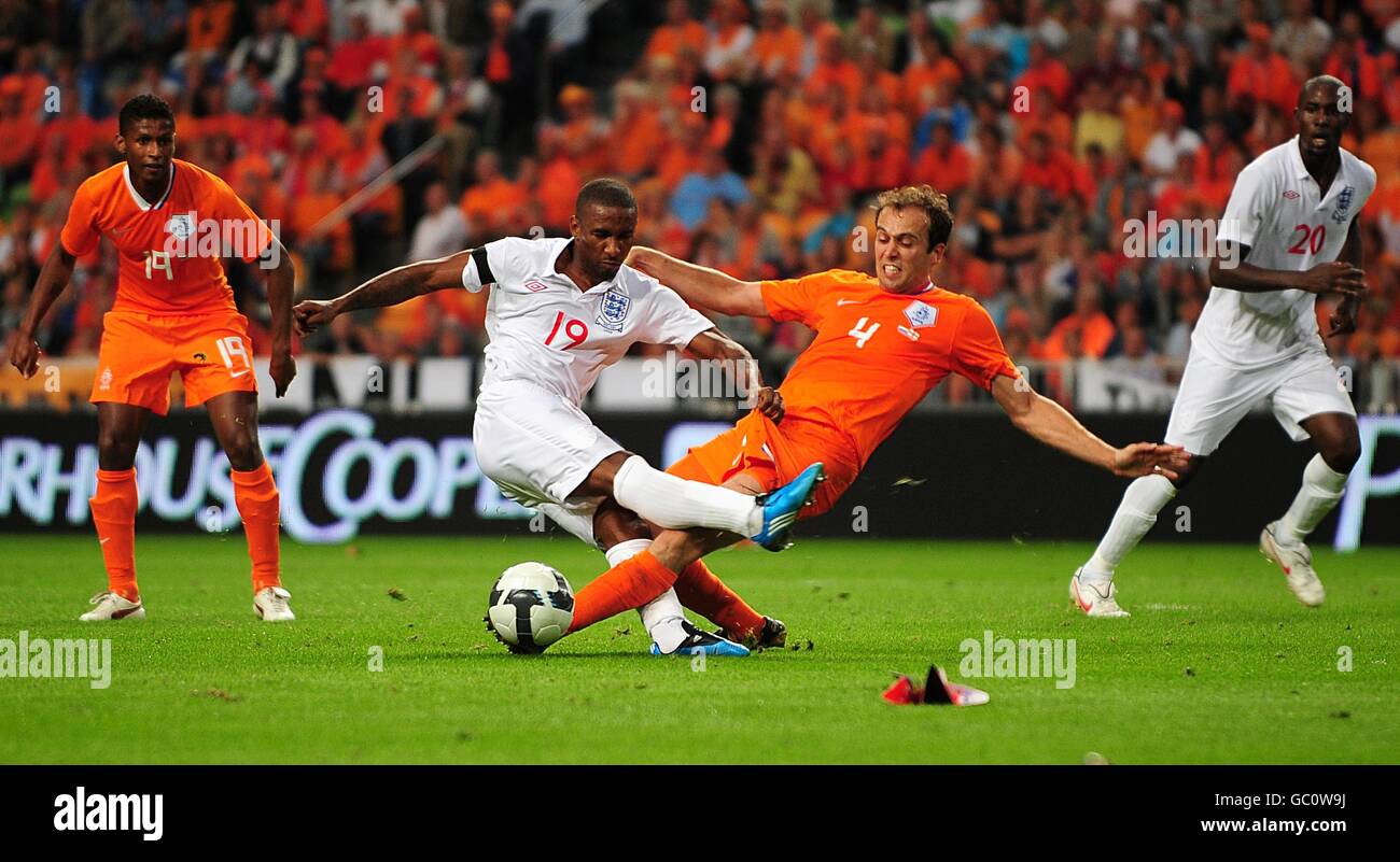 Mathijsen England's Jermain Defoe (left) and Holland's Joris Mathijsen (right ...