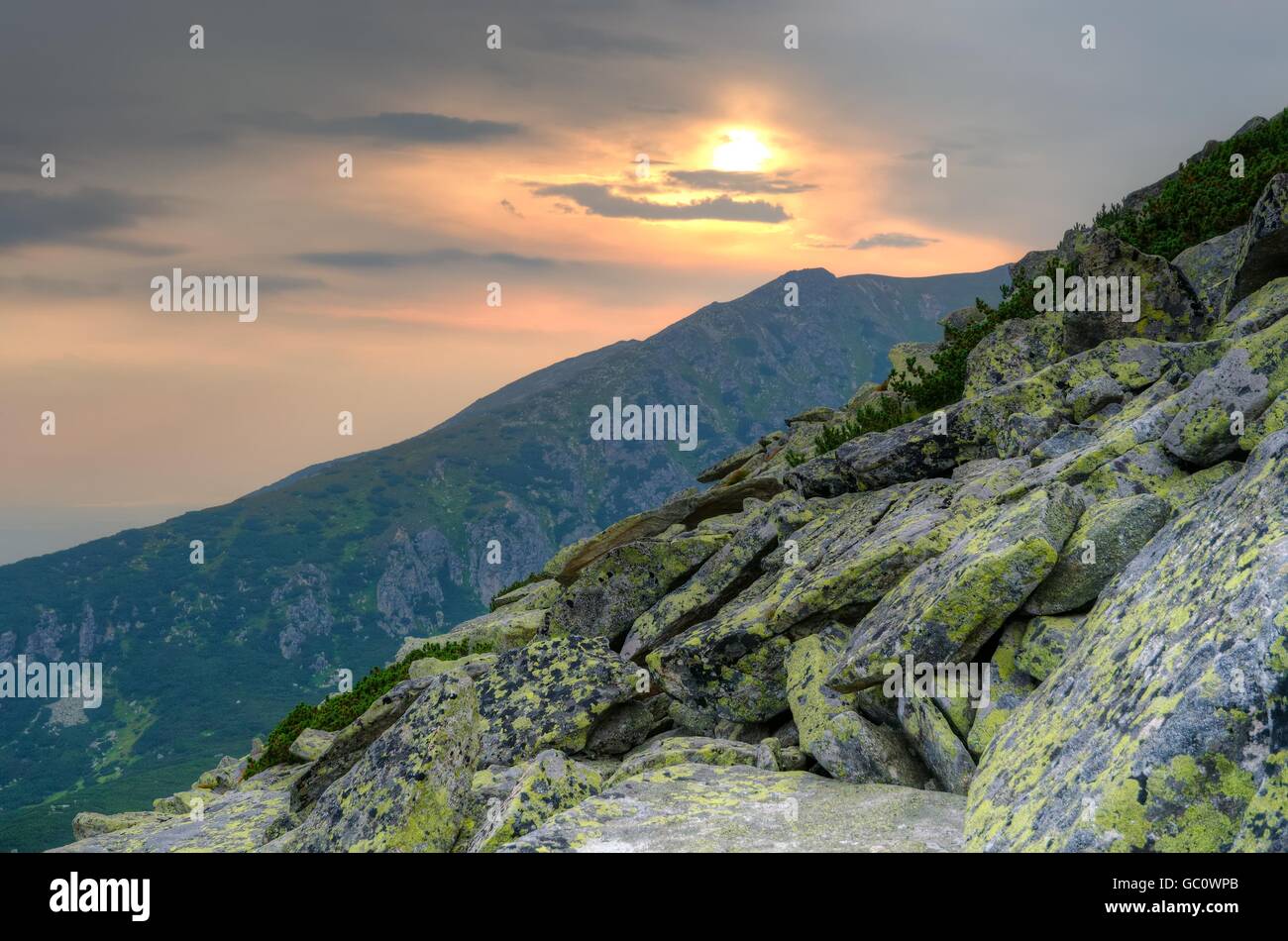 Summer mountain landscape at susnet. Mountain peaks in High Tatra, Slovakia. Stock Photo