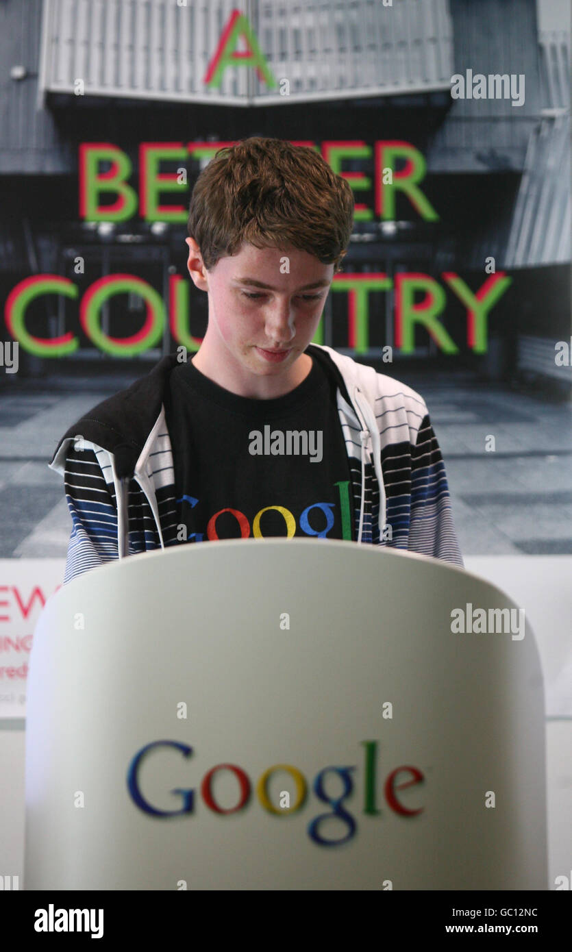 Teenagers, including Alexander Hill, 15, from King Alfred School in Golders Green, north-west London, presents his group's online service that they have designed over the course of the weekend as part of The Young Rewired State at Google's headquarters in central London. Stock Photo