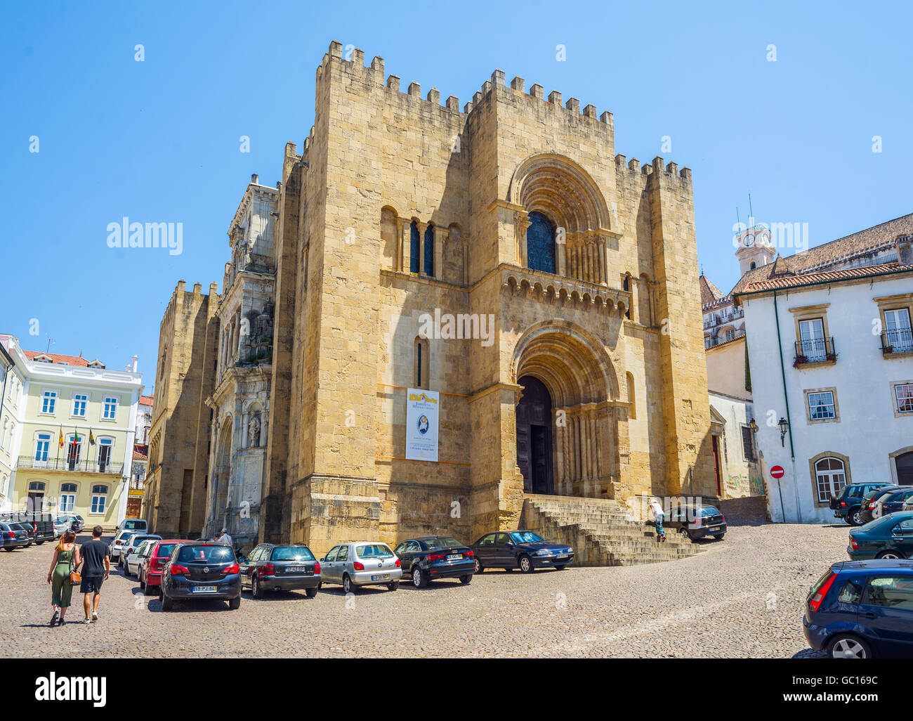 Principal facade of Se Velha, Santa Maria de Coimbra, the old Cathedral of Coimbra. Portugal. Stock Photo