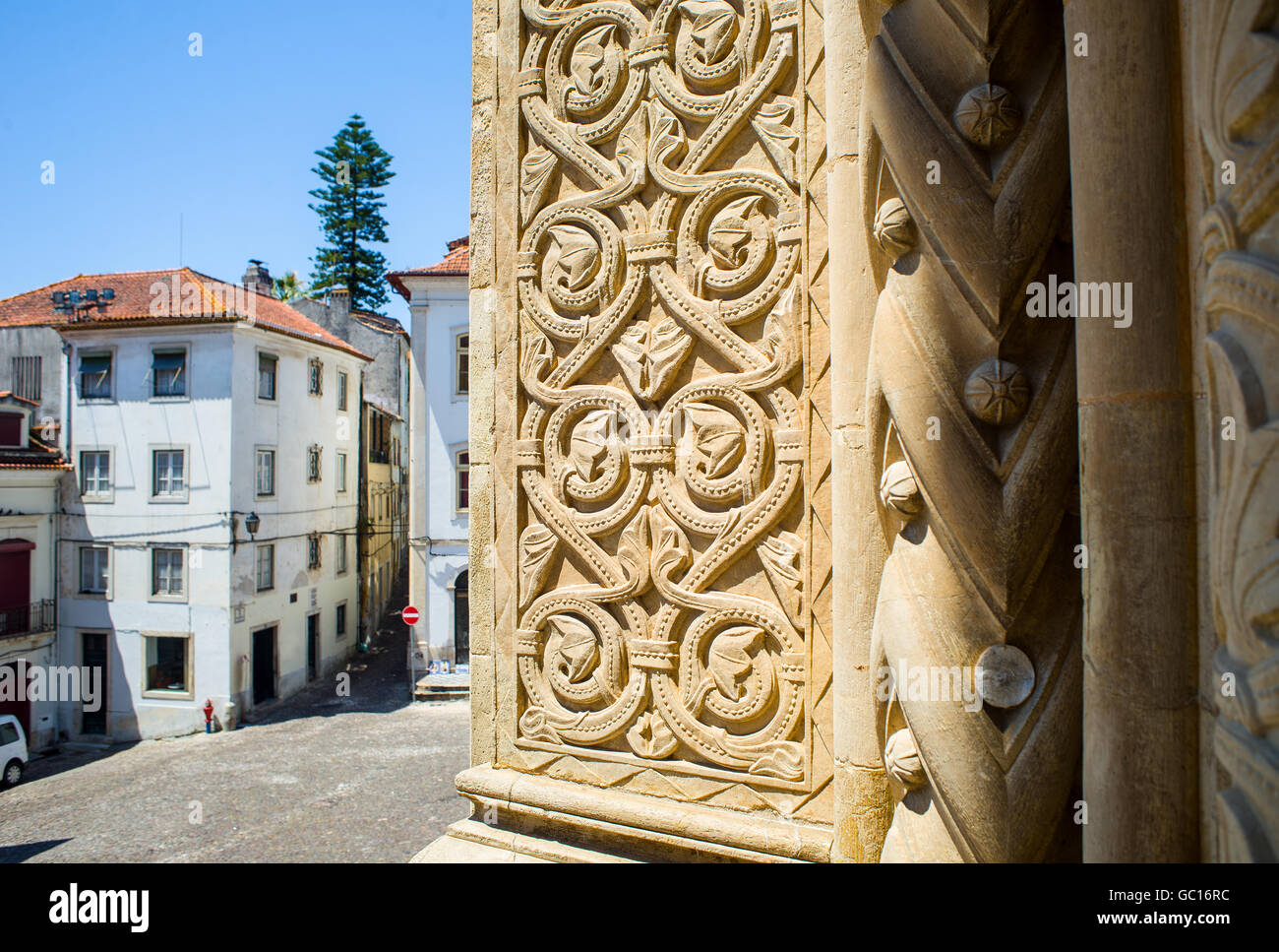 Detail of entry arch of Se Velha, Santa Maria de Coimbra, the old Cathedral of Coimbra. Portugal Stock Photo