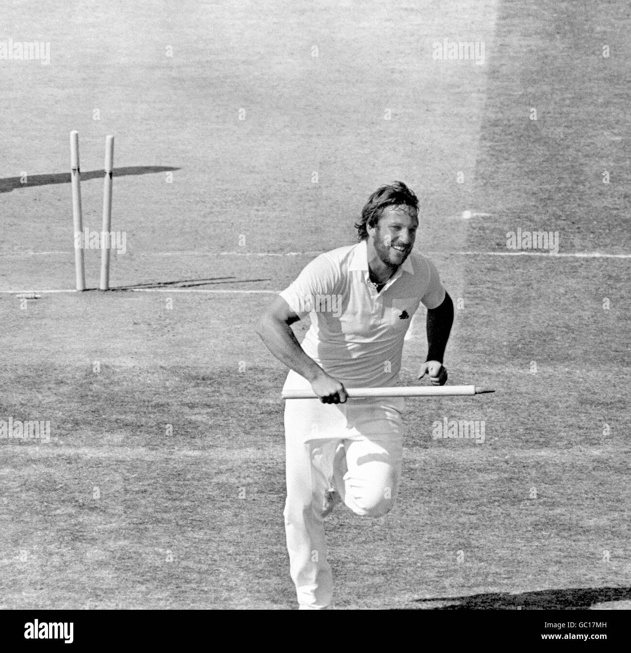 England's Ian Botham races back to the Edgbaston pavilion with a souvenir stump in his hand after England won the Fourth Test to take a 2-1 series lead Stock Photo