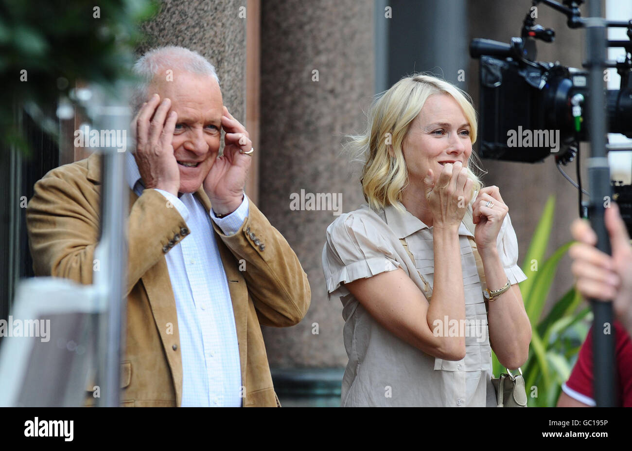 Sir Anthony Hopkins (left) and Lucy Punch on the set of Woody Allen's new film currently titled 'Wasp 09', in London. Stock Photo