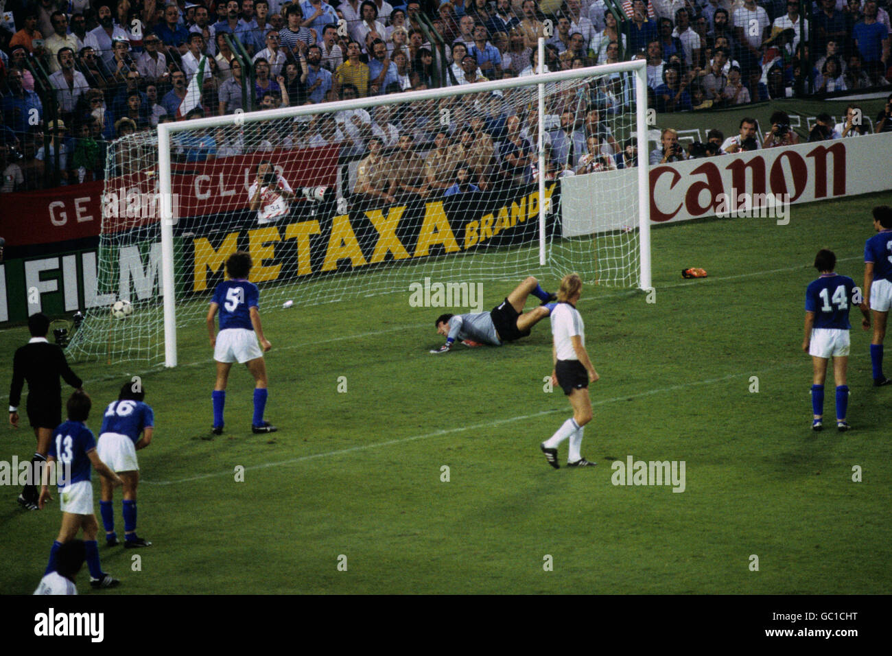 Soccer - FIFA World Cup Final 1982 - Italy v West Germany - Santiago Bernabeu Stadium. Italy goalkeeper Dino Zoff (c) can only watch as Paul Breitner (not pictured) scores a consolation goal for West Germany. Stock Photo