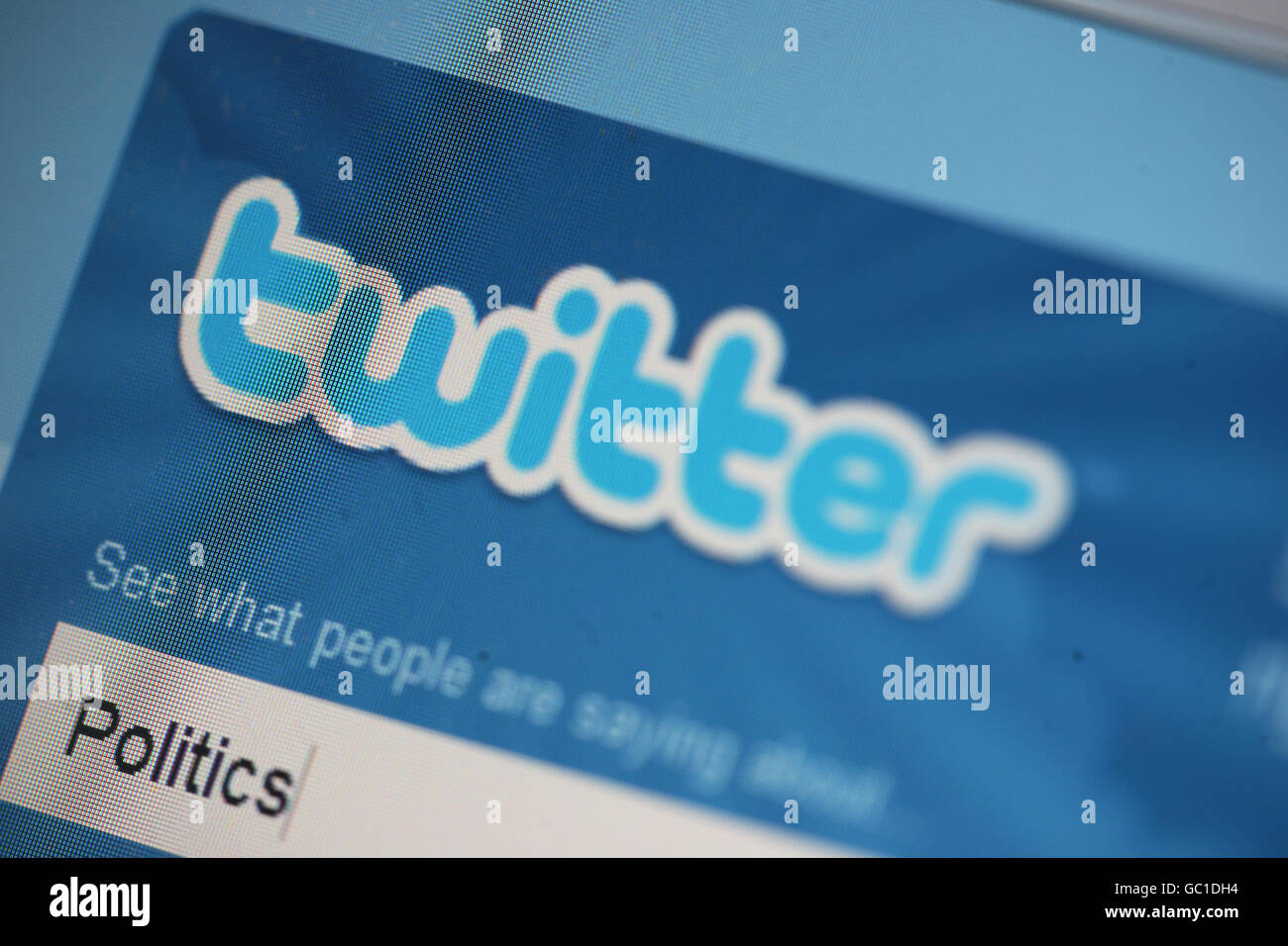 The Twitter icon displayed on a laptop. Stock Photo