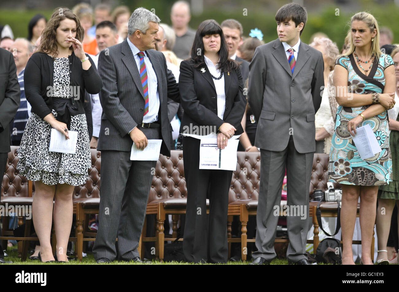 Danielle Harkett, left, the wife of Lance Corporal Christopher Harkett, 22, who was killed in a blast near Musa Qala, in Northern Helmand, on March 14, attends an Order of Service as troops from Charlie Company, 2nd Battalion The Royal Welsh, paid tribute to her husband in a remembrance service at Cardiff Castle after marching through the city. Stock Photo