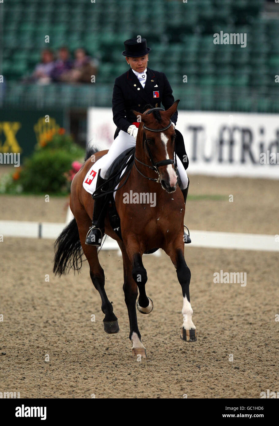 Switzerland's Marcela Krinke Susmelj riding Corinth competes during day two of The European Show Jumping and Dressage Championships, Windsor. Stock Photo