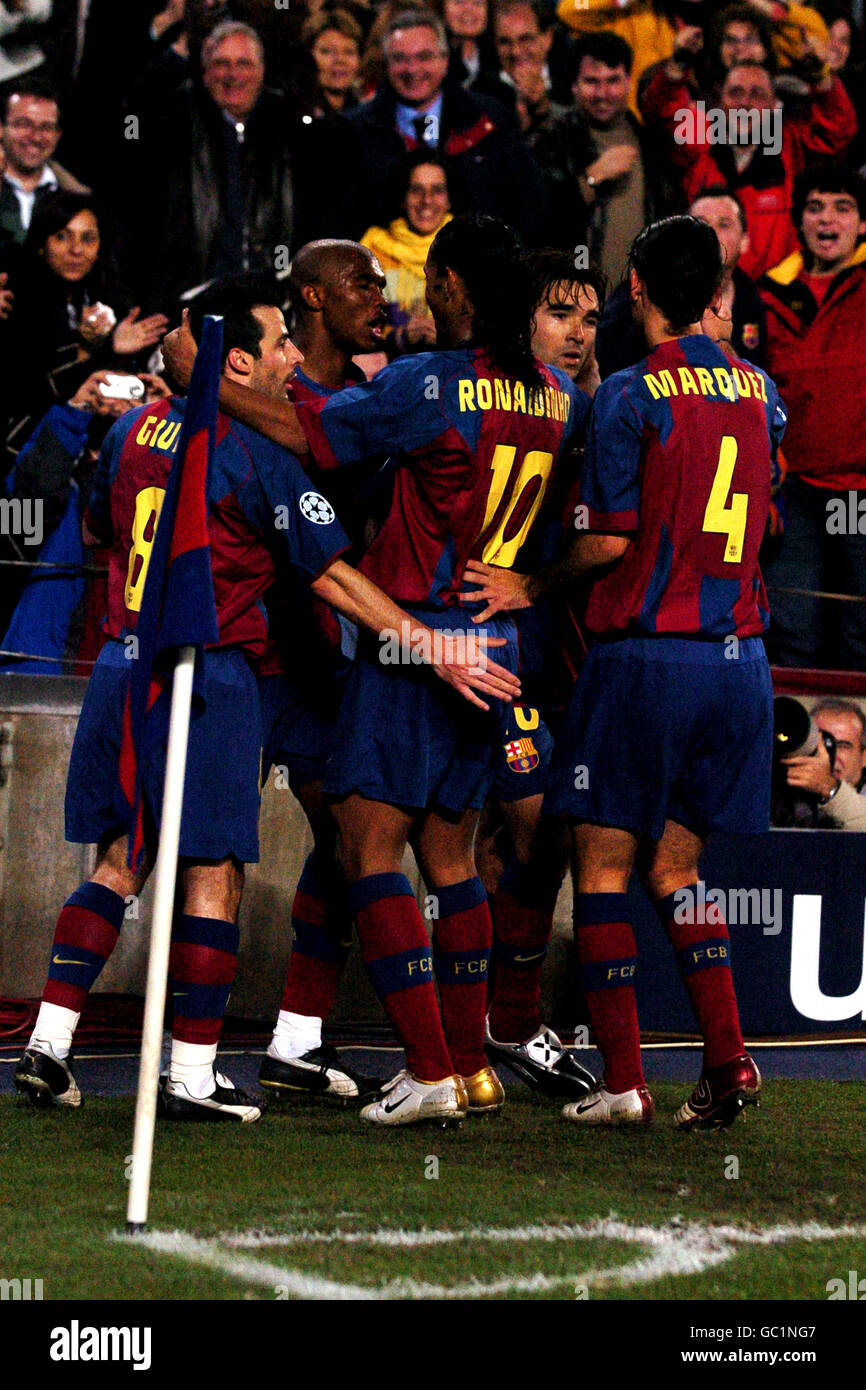 (L-R) Barcelona players Ludovic Giuly, Ronaldinho Rafael Marquez and Deco celebrate Samuel Eto'o's (second left) goal Stock Photo