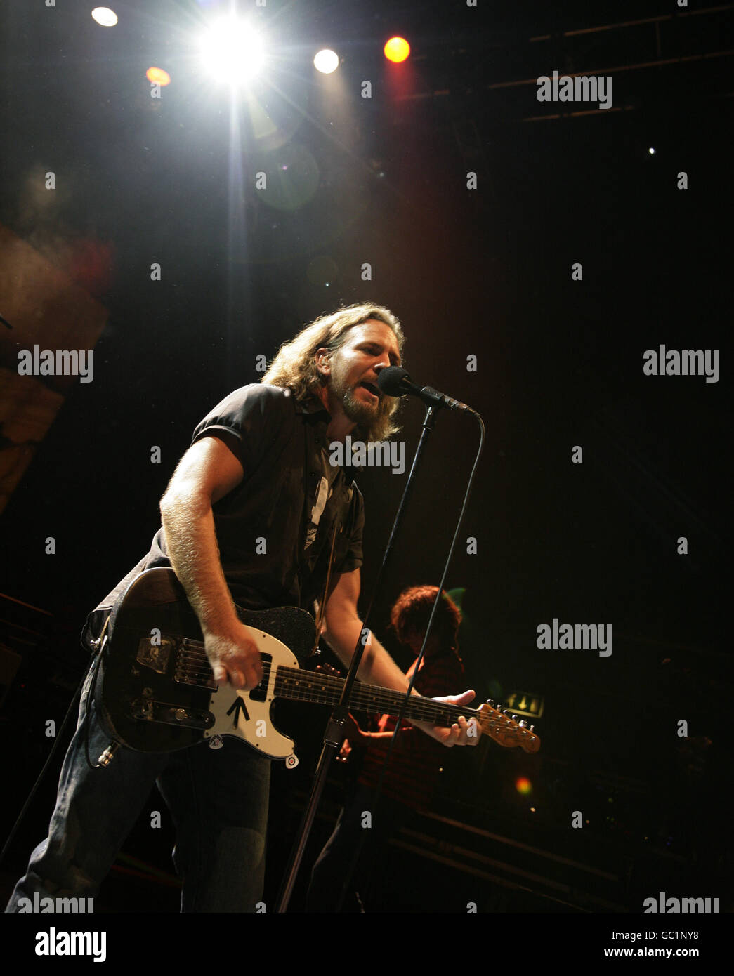 Pearl Jam, with lead singer Eddie Vedder, performing on stage at the O2 Shepherds Bush Empire in