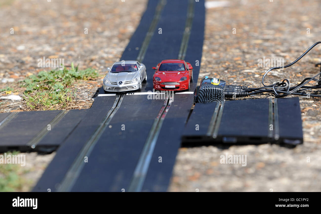 Scalextric cars are placed on the track ahead of a Guinness World
