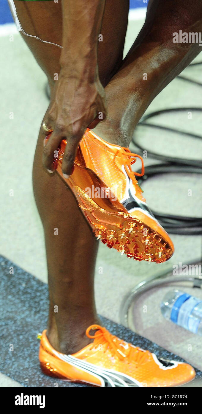 A view of the running shoes worn by Jamaica's Usain Bolt who won the men's  100m final in a new world record time of 9.58 seconds during the IAAF World  Championships at