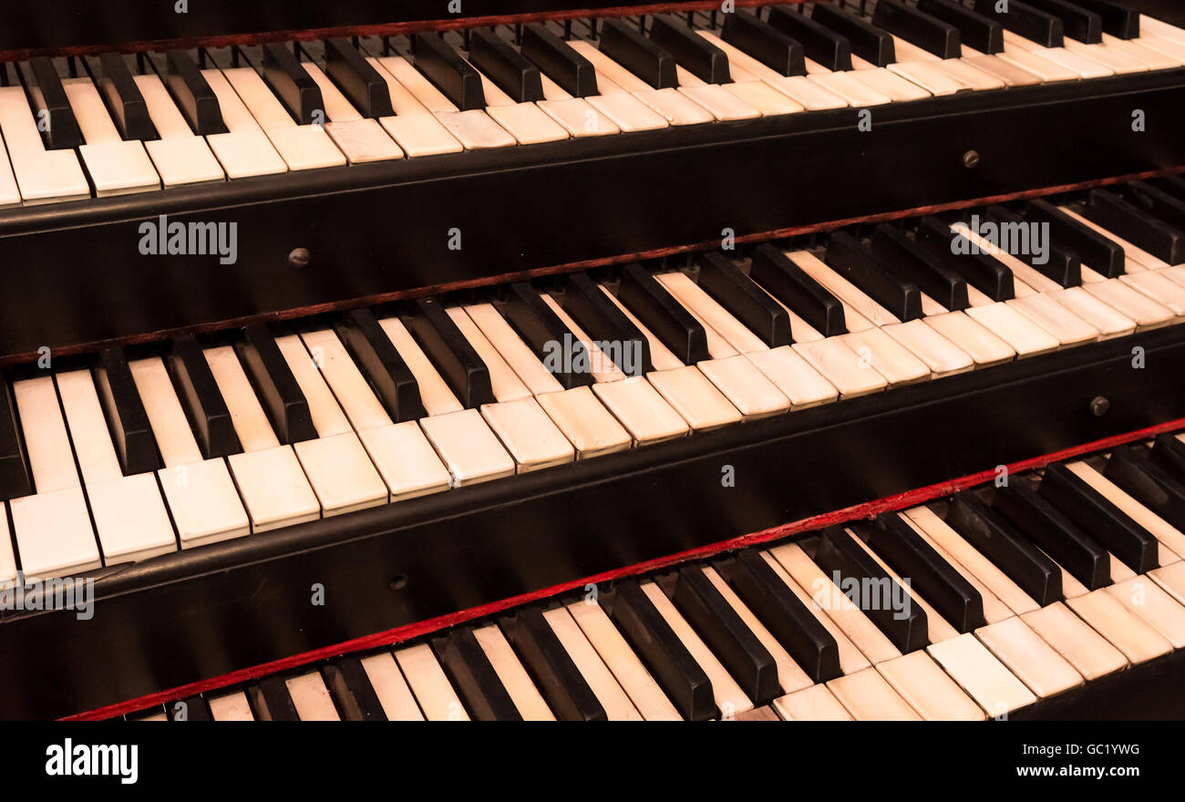 Old ivory keyboard manuals of a classical church organ Stock Photo Alamy