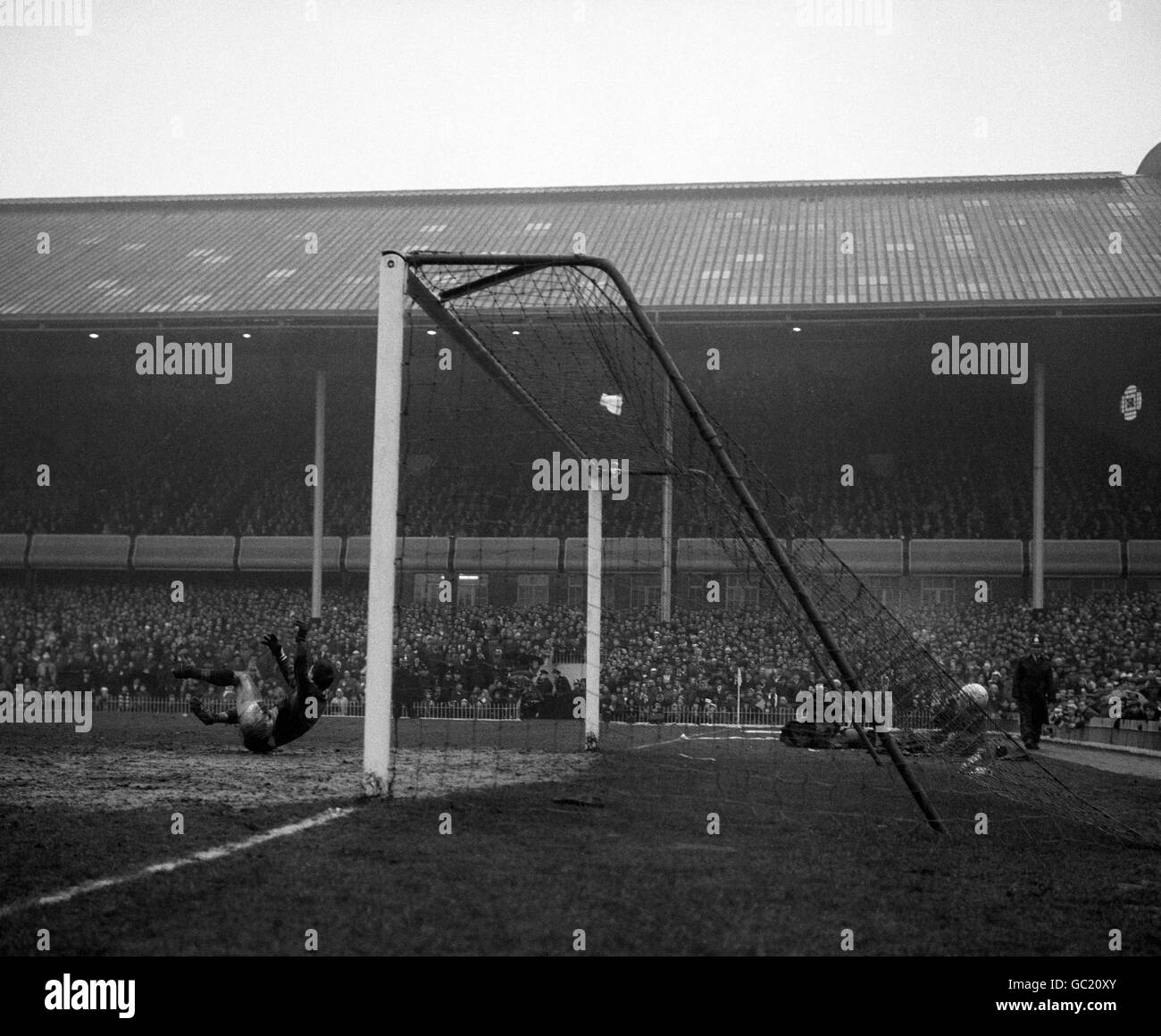 Swansea goalkeeper Noel Dwyer hits the ground as the ball finds the back of the net for Preston North End's second goal, scored by Anthony Singleton. Stock Photo