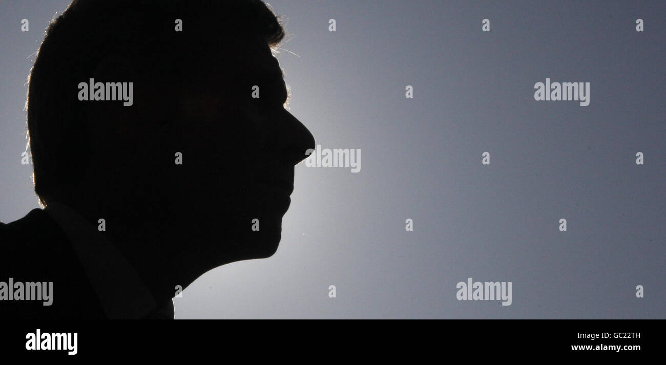 The silhouette of Justice Secretary Kenny MacAskill is seen during a