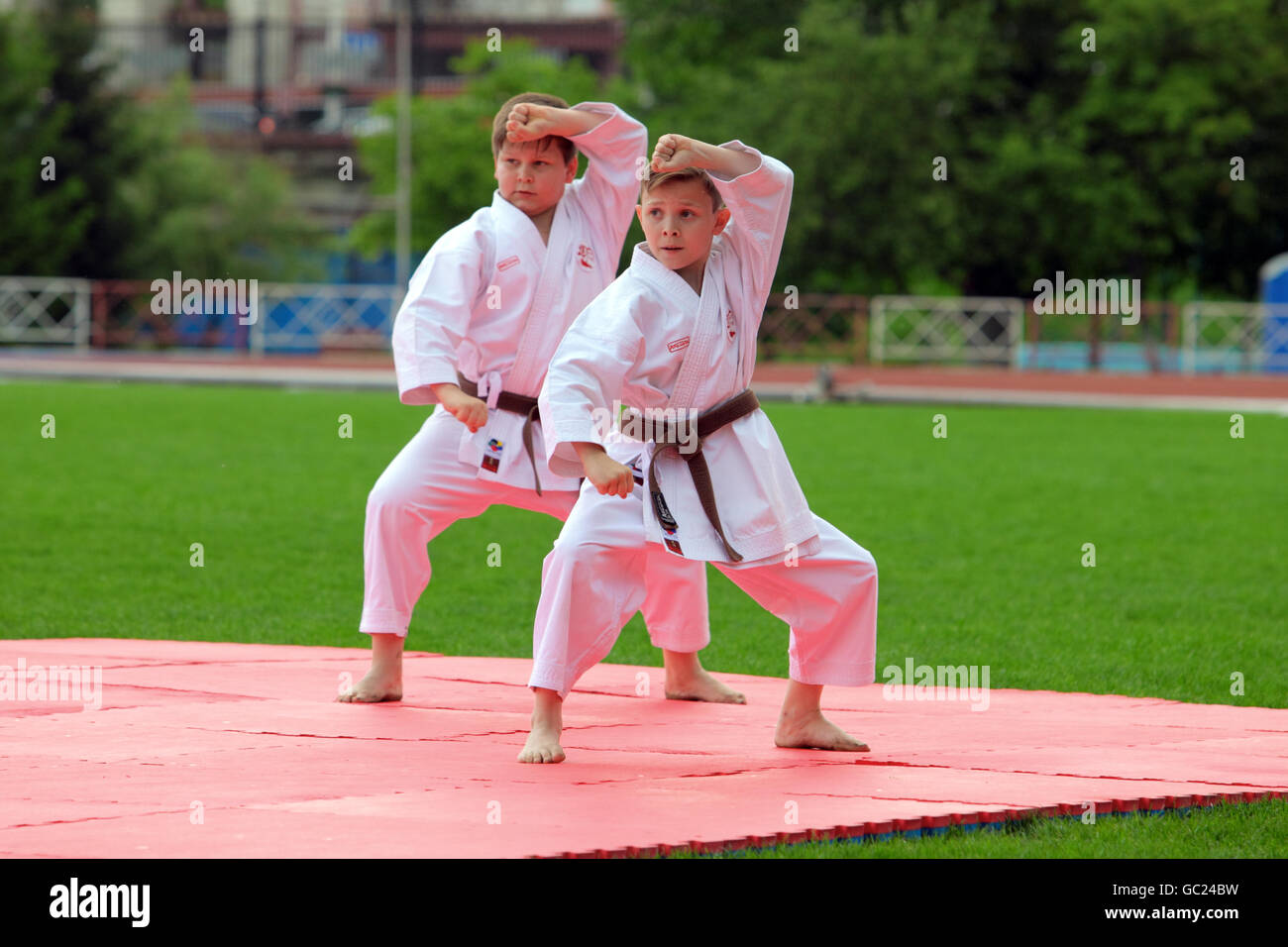 Kids karate exercise outdoors Stock Photo Alamy