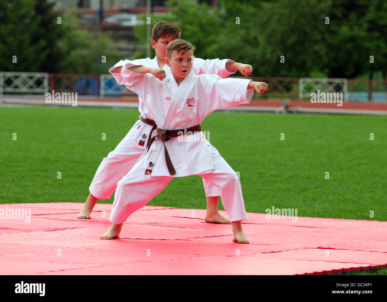 Kids karate exercise outdoors Stock Photo Alamy