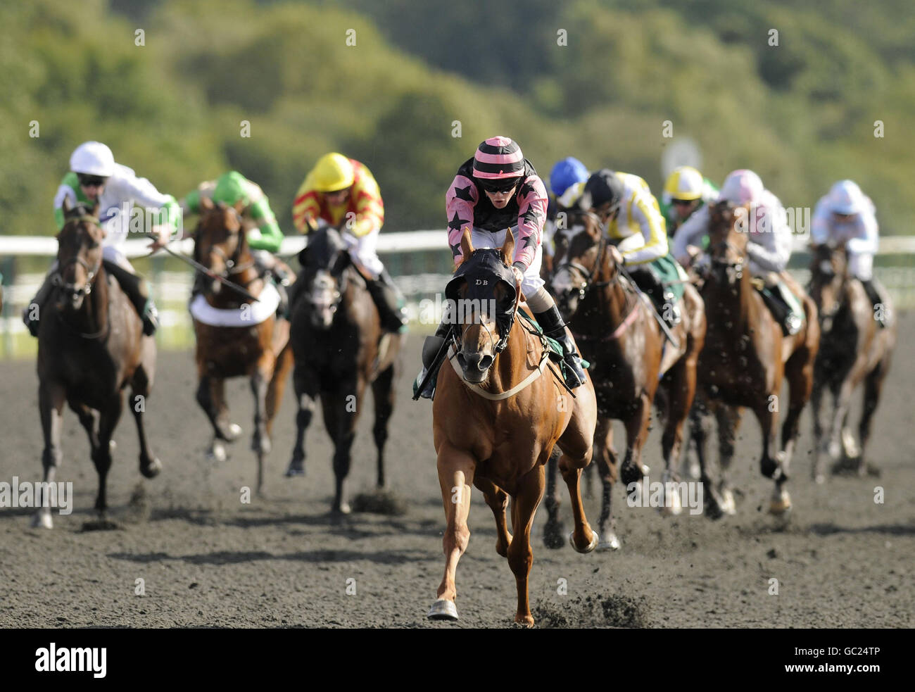 Jaconet ridden by Philip Makin (centre) goes on to win The Burstow Handicap at Lingfield Racecourse. Stock Photo