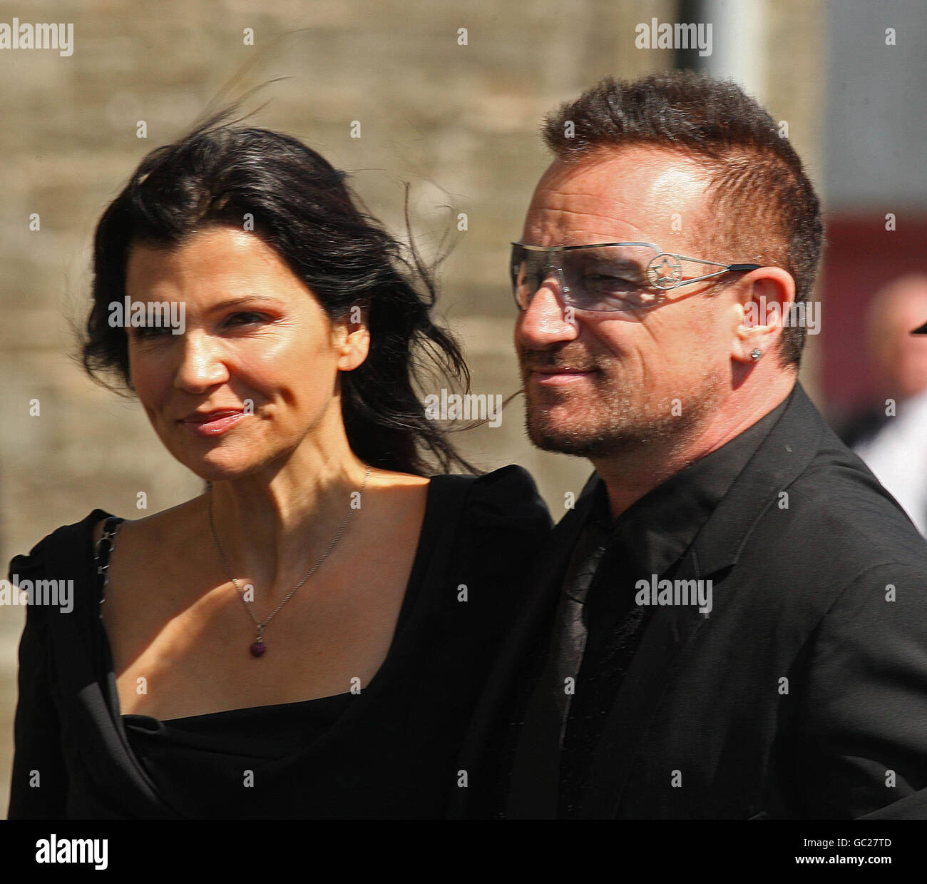 Bono and his wife Ali Hewson attend the wedding of Andrea Corr and Brett Desmond, son of Dermot Desmond taking place in St.Joseph's Church in Miltown Malbay Co Clare. Stock Photo