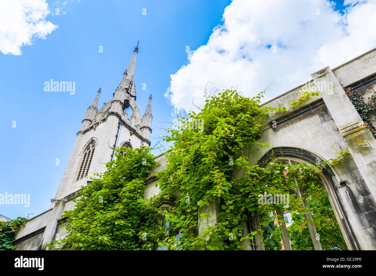 St. Dunstan-in-the-East, a church was largely destroyed in the Second World War and the ruins are now a public garden in London Stock Photo