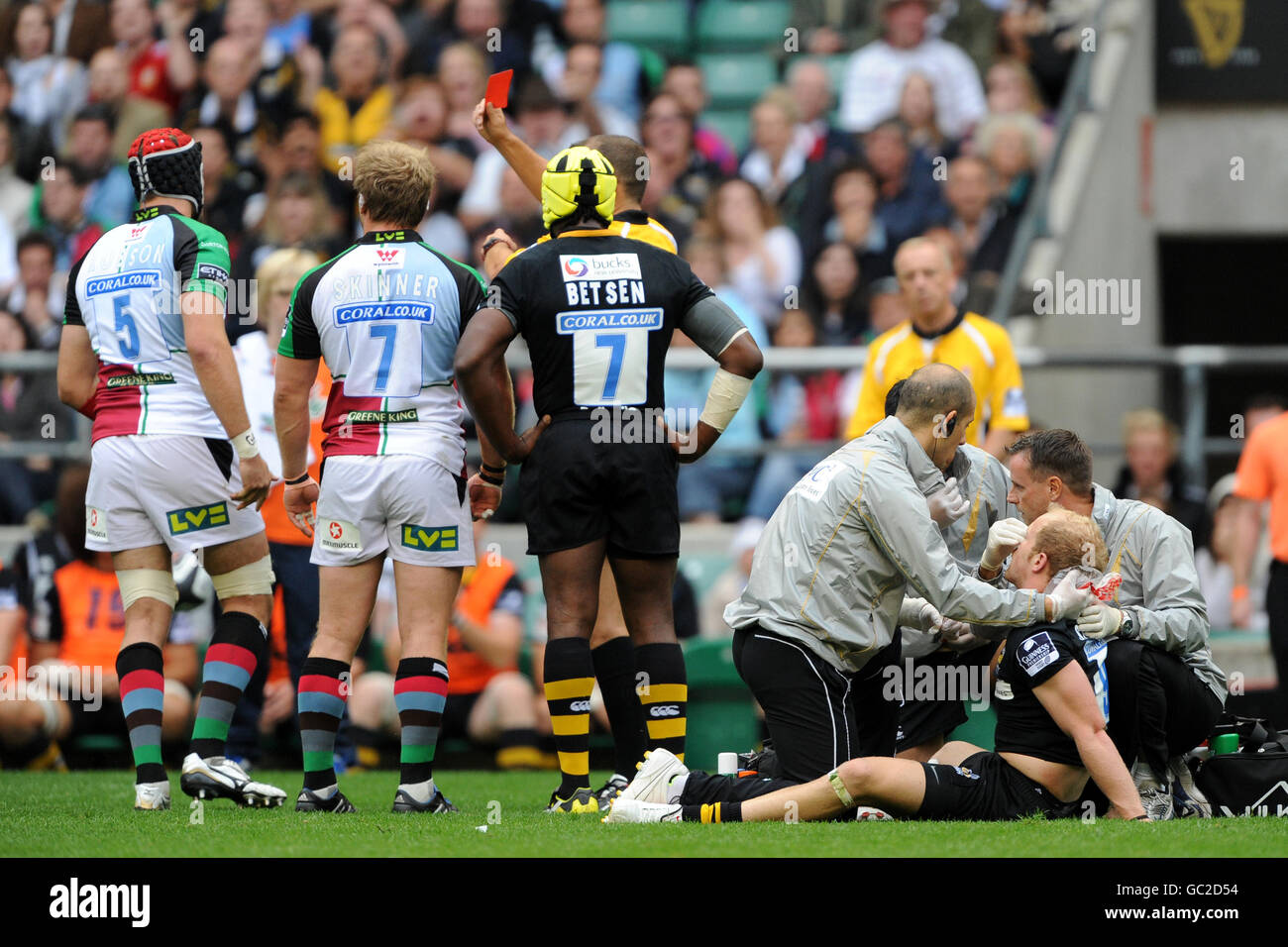 Harlequins' George Robson is shown the red card by referee Dean ...