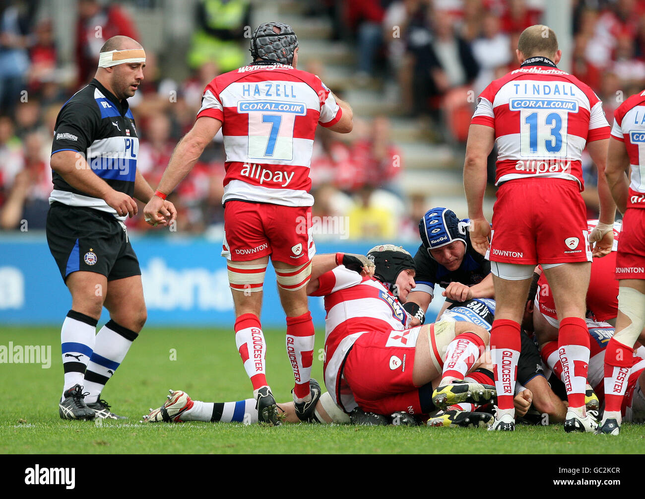 Rugby Union - Guinness Premiership - Gloucester Rugby v Bath Rugby - Kingsholm. Gloucester Rugby's Andrew Hazell stamps on the leg of Bath Rugby's Julian Salvi to earn himself a yellow card Stock Photo
