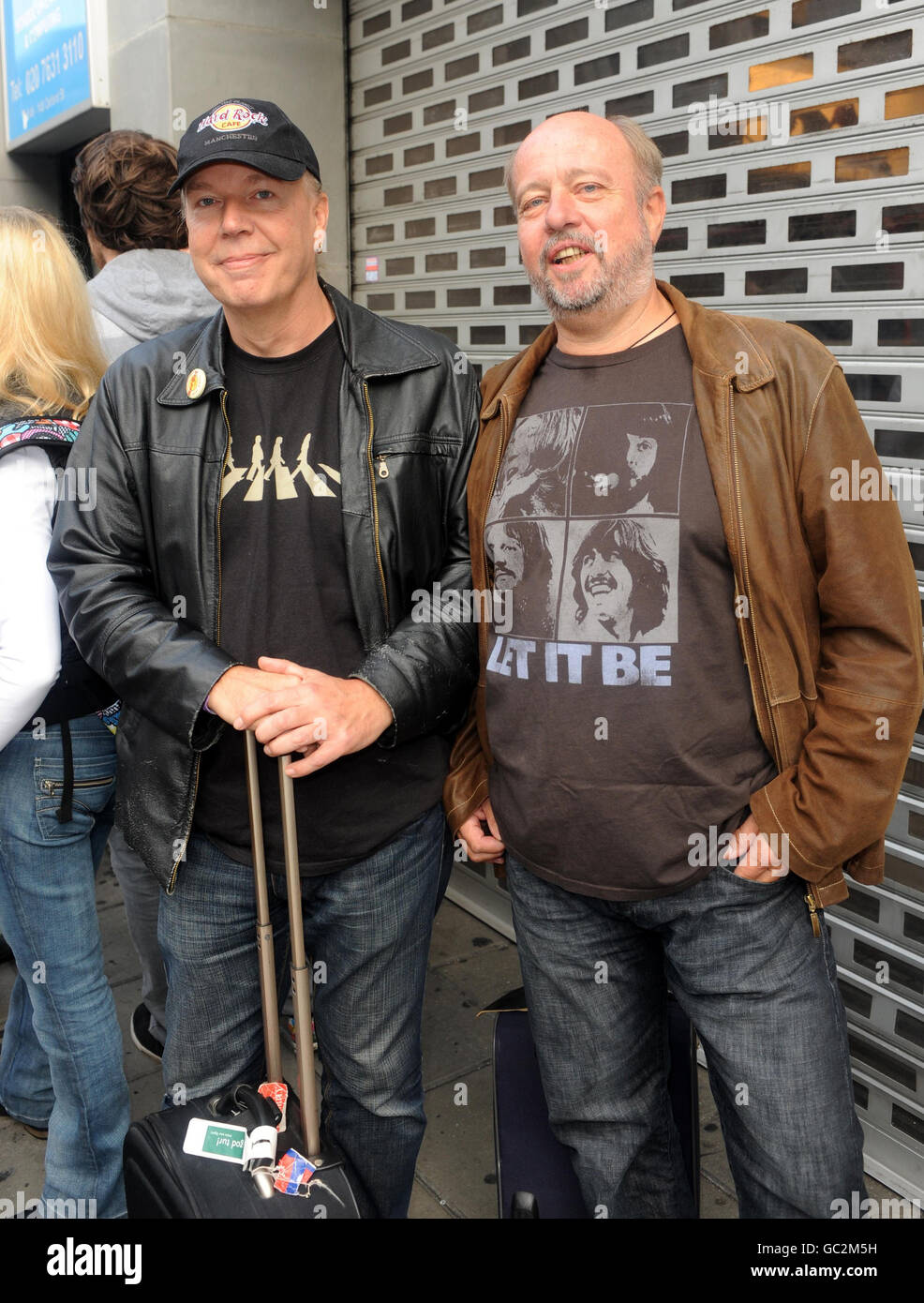 Beatles fans, Lars Jensen (left) and Tom Hugo Sorensen, both from queue for the release of The Beatles Band game and the release of the Beatles remasters at