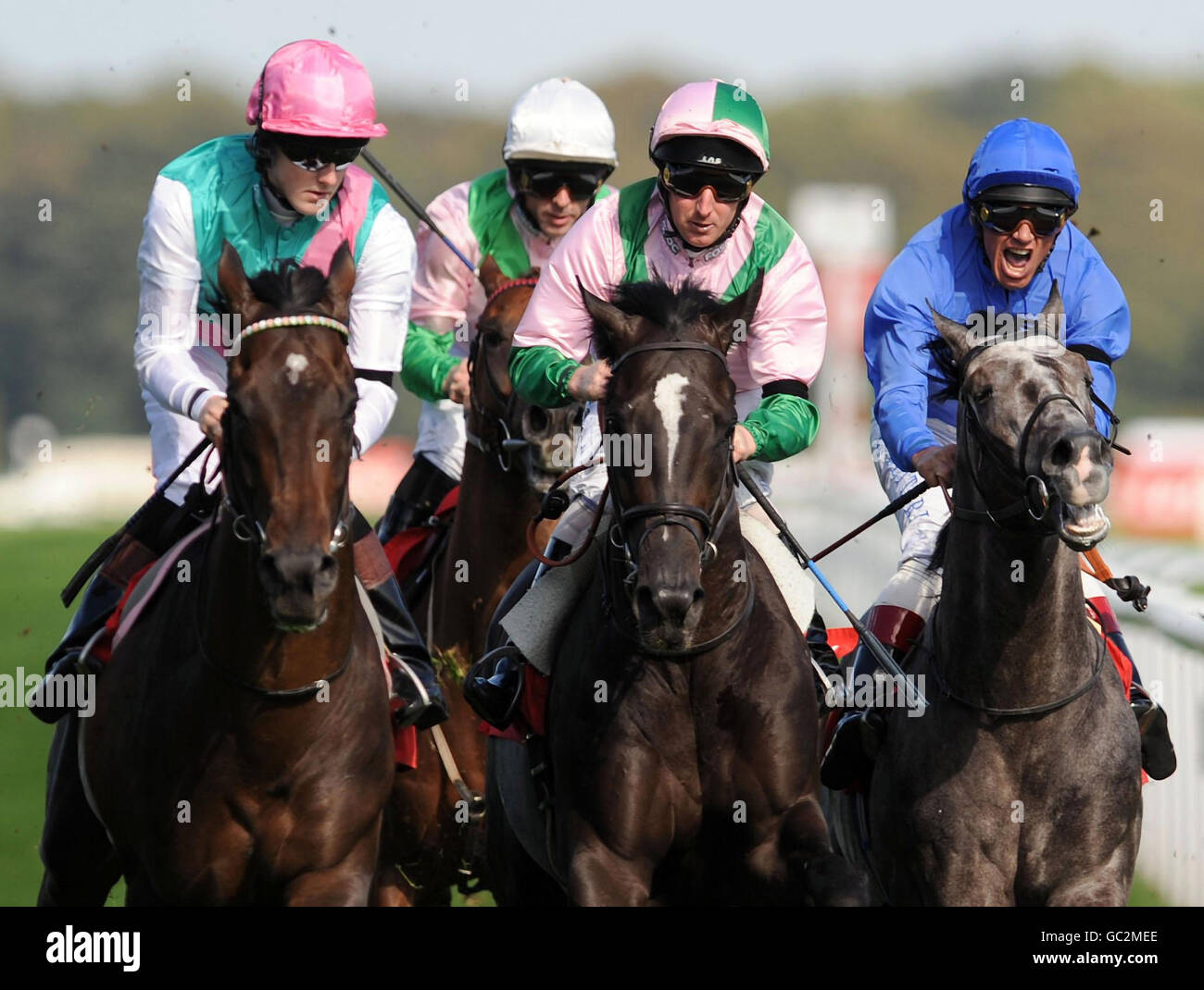 Tom Queally and Twice Over (left) win the Debenhams Frenchgate Conditions Stakes during The Frenchgate 5 Raceday in the Ladbrokes St Leger Festival at Doncaster Racecourse. Stock Photo