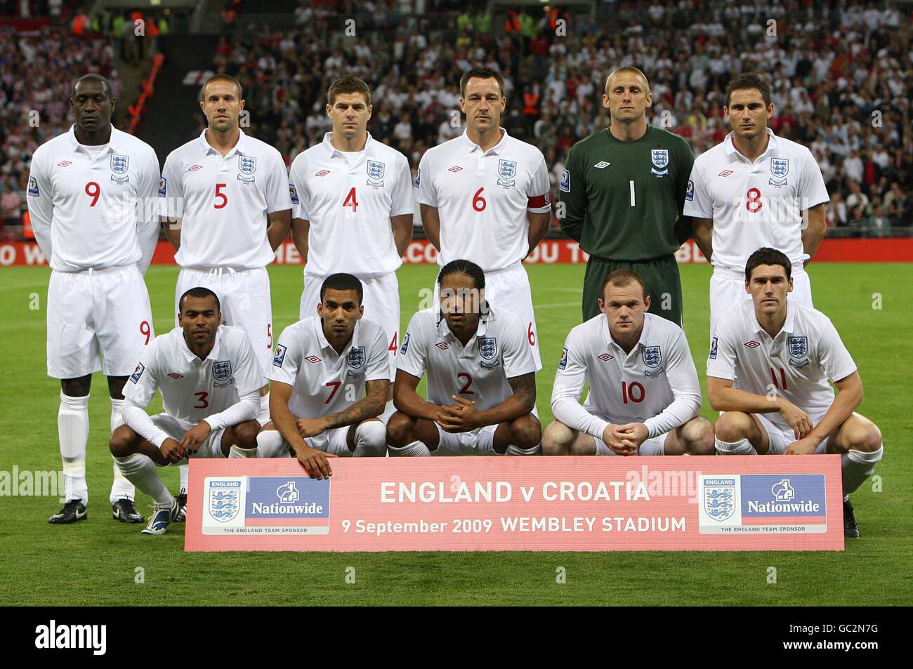 England players line up pre match at wembley stadium hires stock