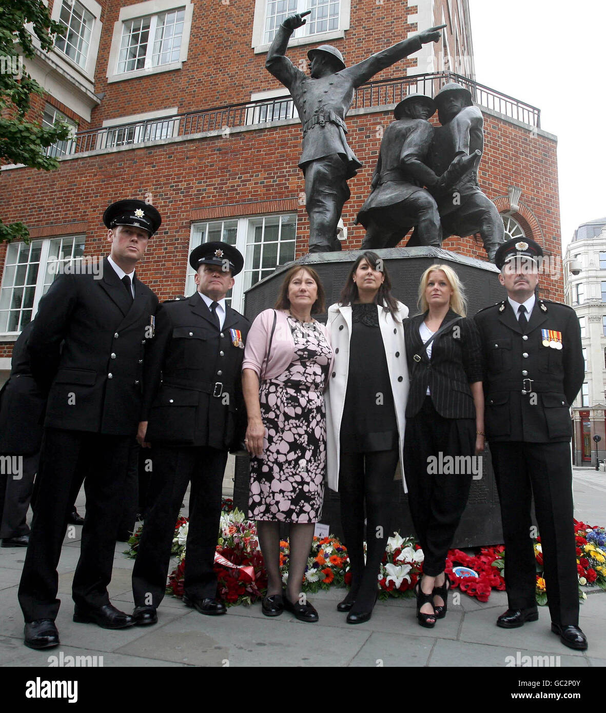 (Left to right) Firefighter Scott Westworth, Watch Manager Tim Foley, Linda Williamson, Lynsey Baird, Rebecca Williamson and Chief Fire Officer Brian Allaway of Lothian and Borders Fire Rescue Service during the Annual International Firefighters Service of Remembrance in London. Stock Photo