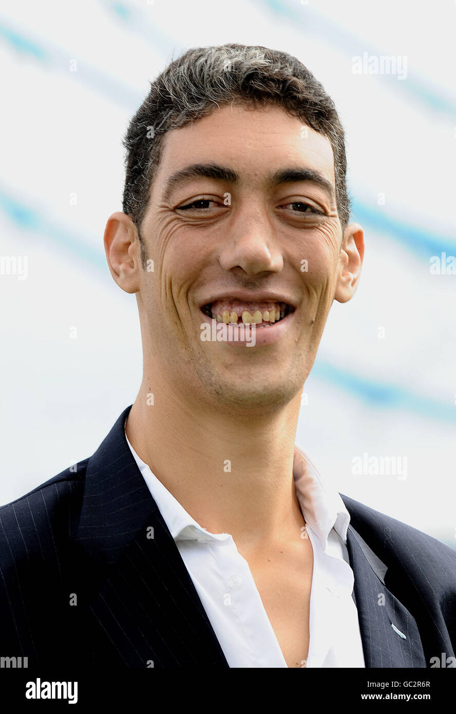 Sultan Kosen, from Turkey, is announced as the Guinness World Records Tallest Man standing at 8ft 1, seen in Potters Field in London. Stock Photo