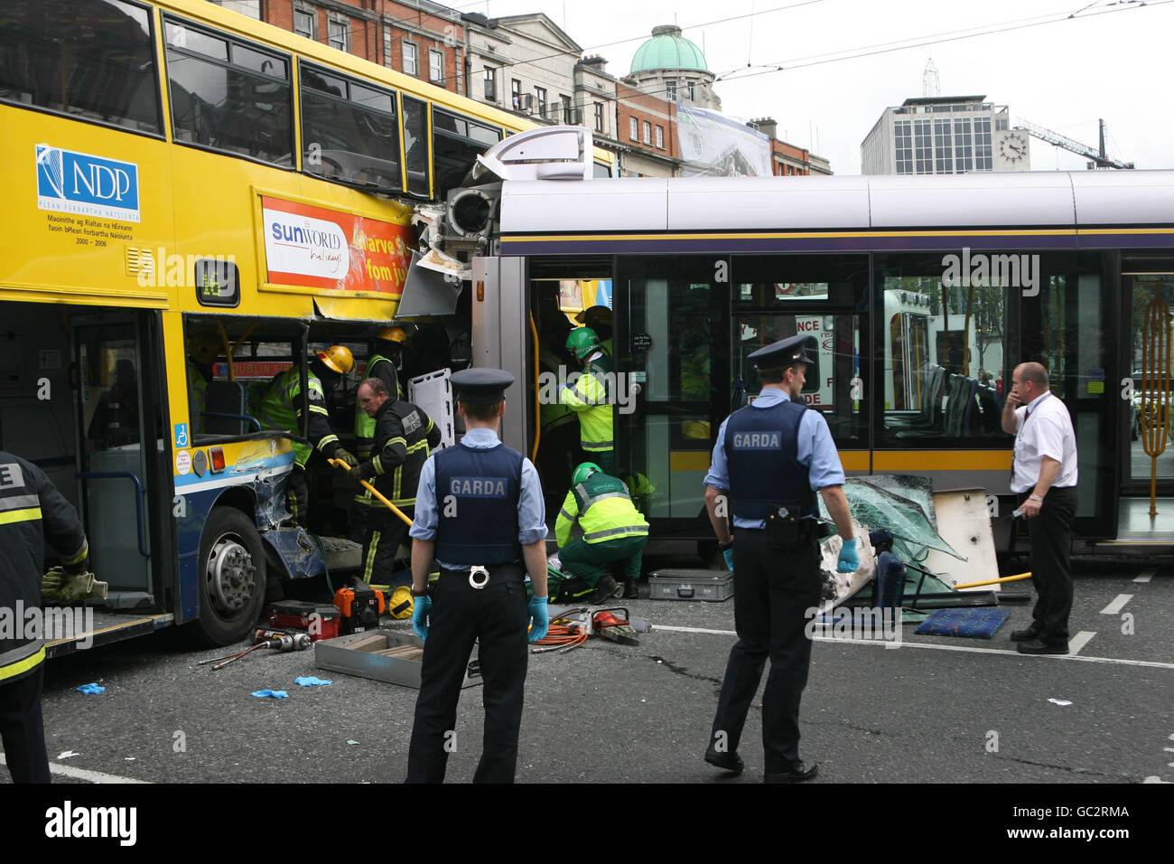 Emergency services at the scene of a crash between a Bus and a Luas tram on Dublin's O'Connell Street. Stock Photo
